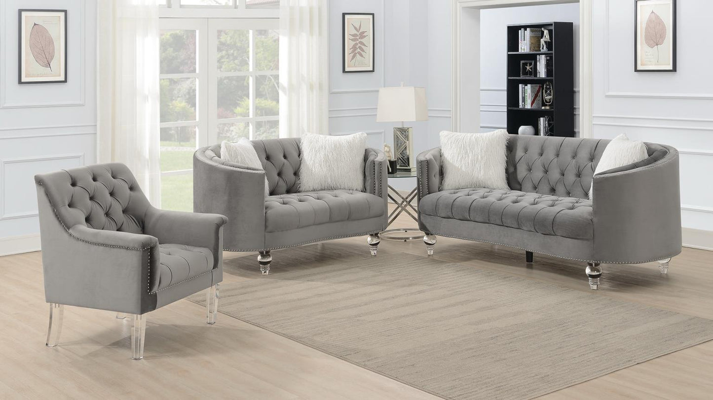 GRAY SOFA W/TWO WHITE FUR PILLOWS & ACRYLIC LEGS