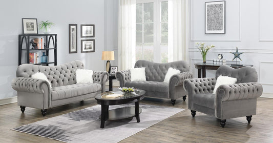 GRAY CHAIR W/ONE WHITE FUR PILLOWS & WOODEN LEGS